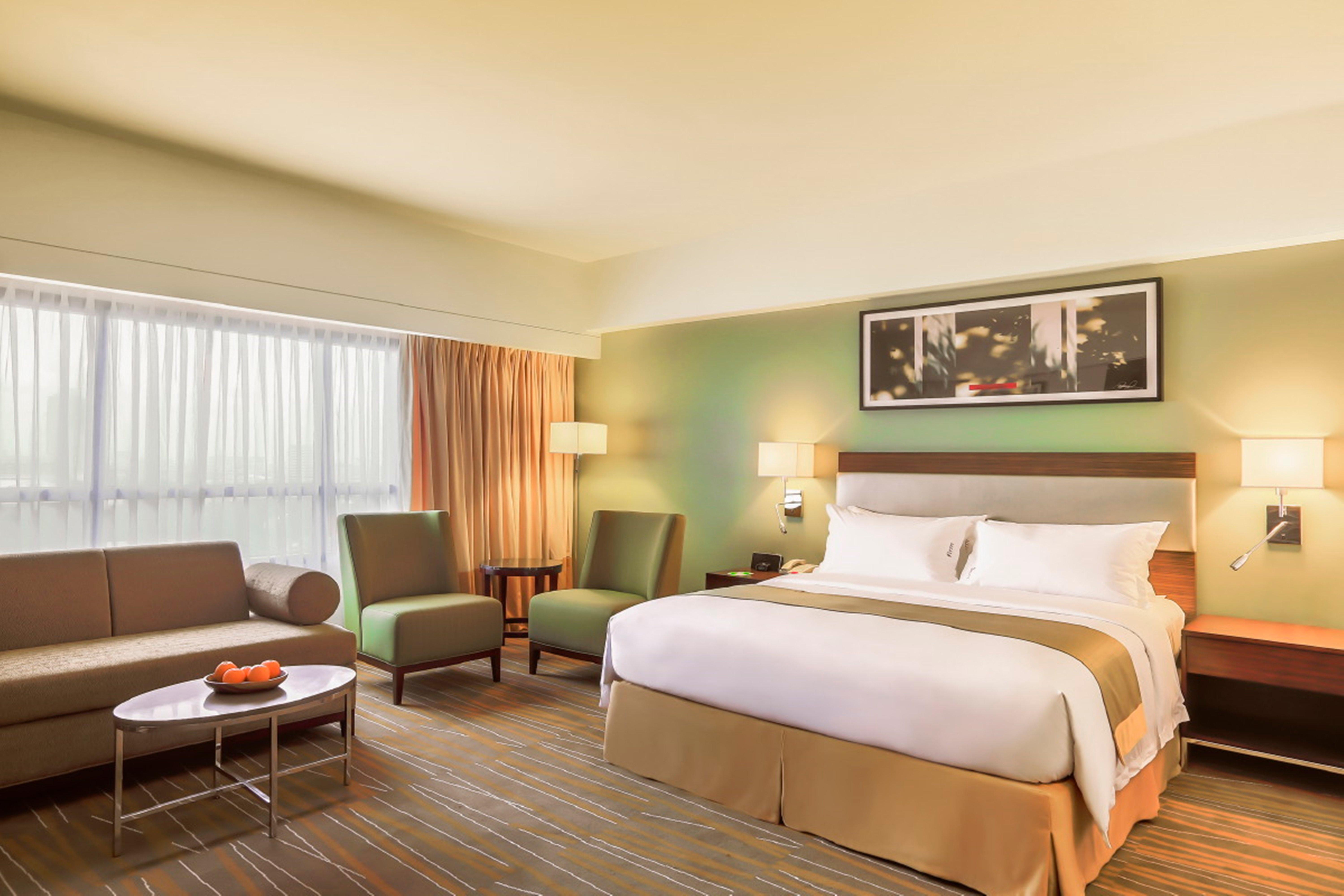 Holiday Inn & Suites Makati By Ihg Makati City Buitenkant foto A typical room at the Holiday Inn